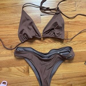 Black bough brown bikini